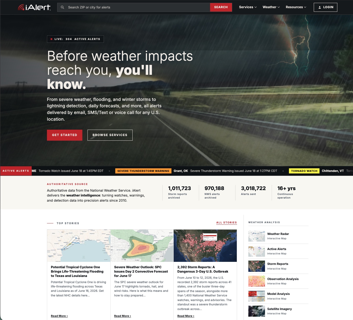 The redesigned iAlert.com homepage showing 
  the new interface, live alerts, top stories, and weather analysis tools